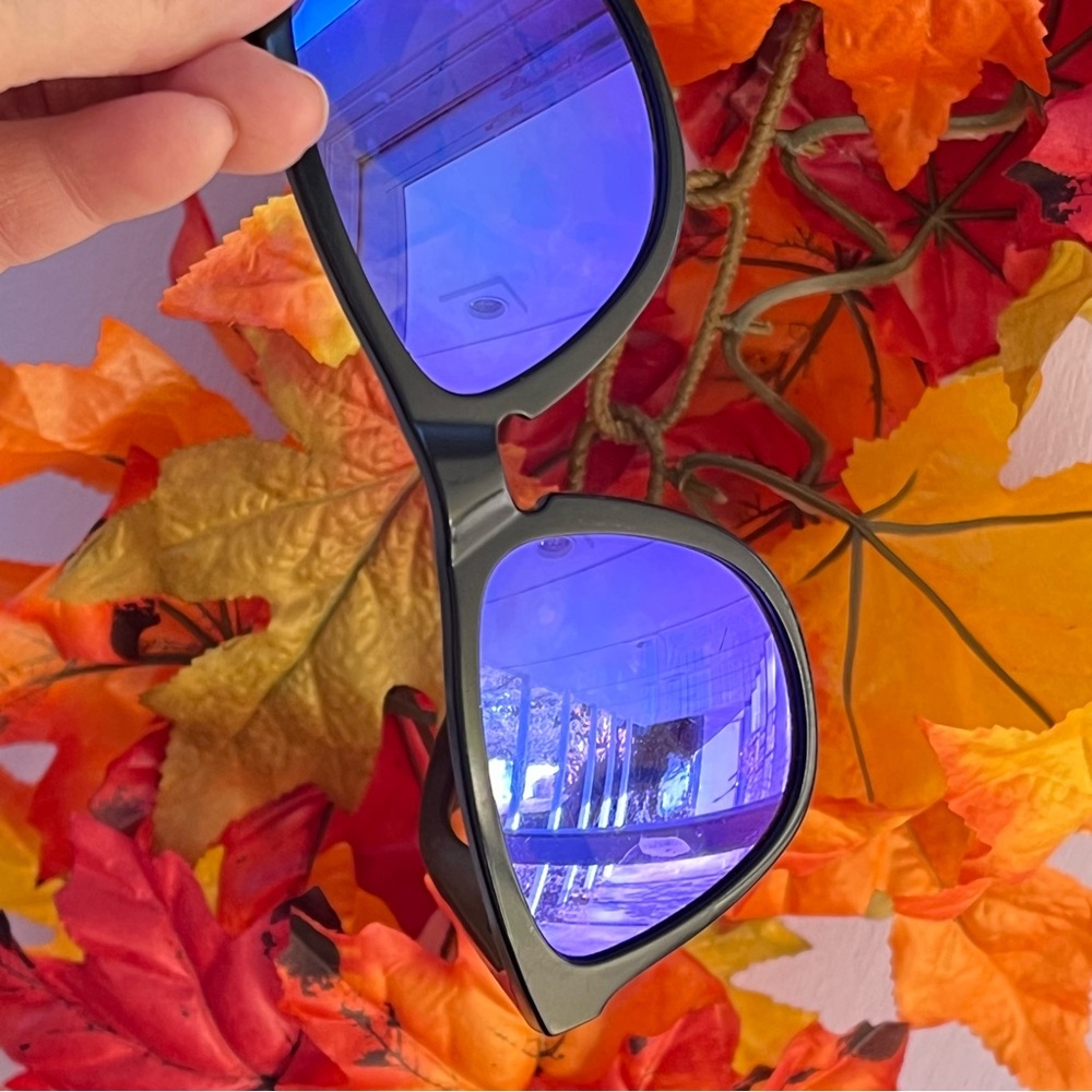Oakley Black Frame Sunglasses with Blue Mirrored Lenses
